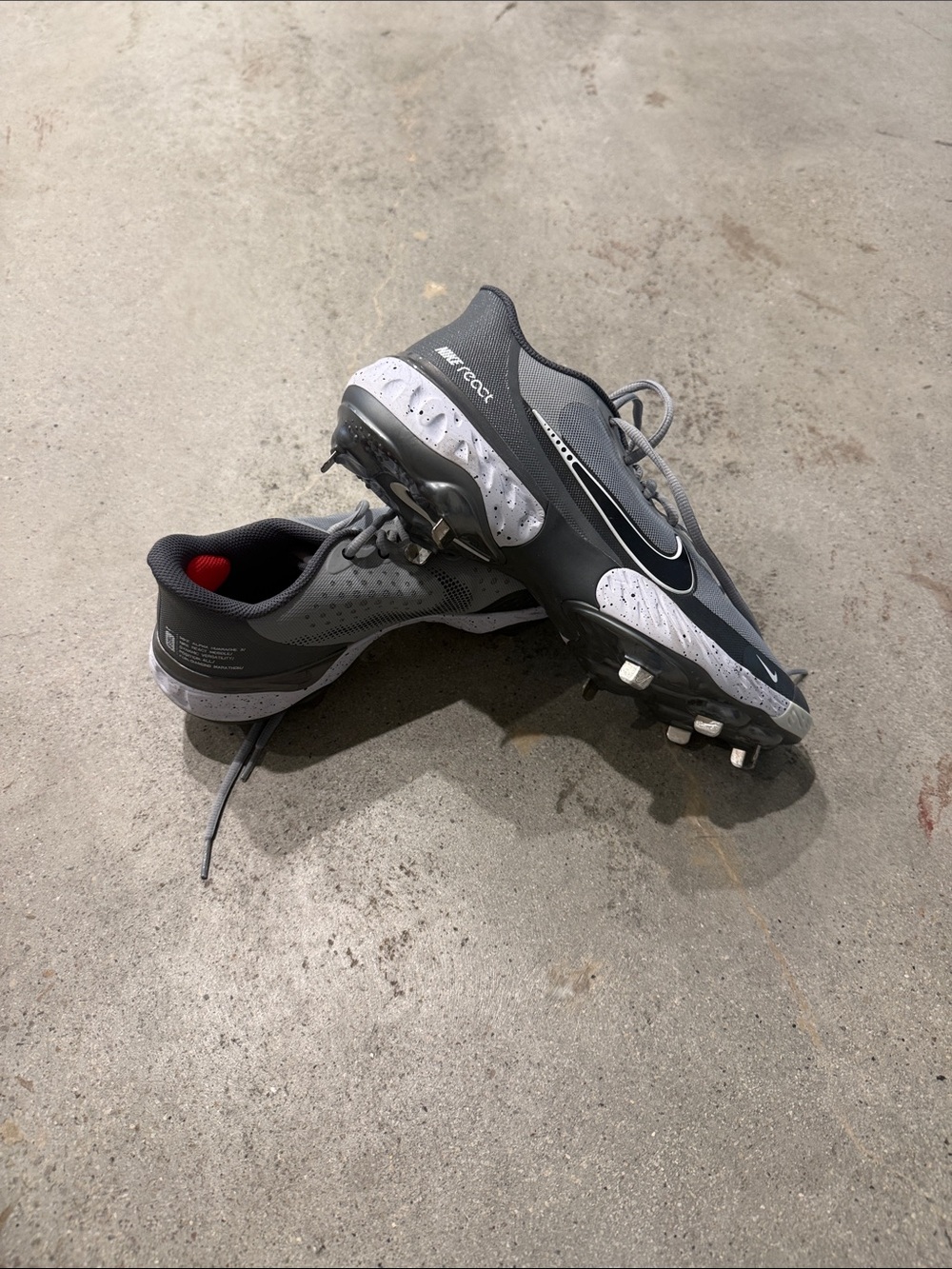 Nike Men’s Gray and White Athletic Cleats